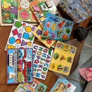 Lot of Toddler Puzzles with rack